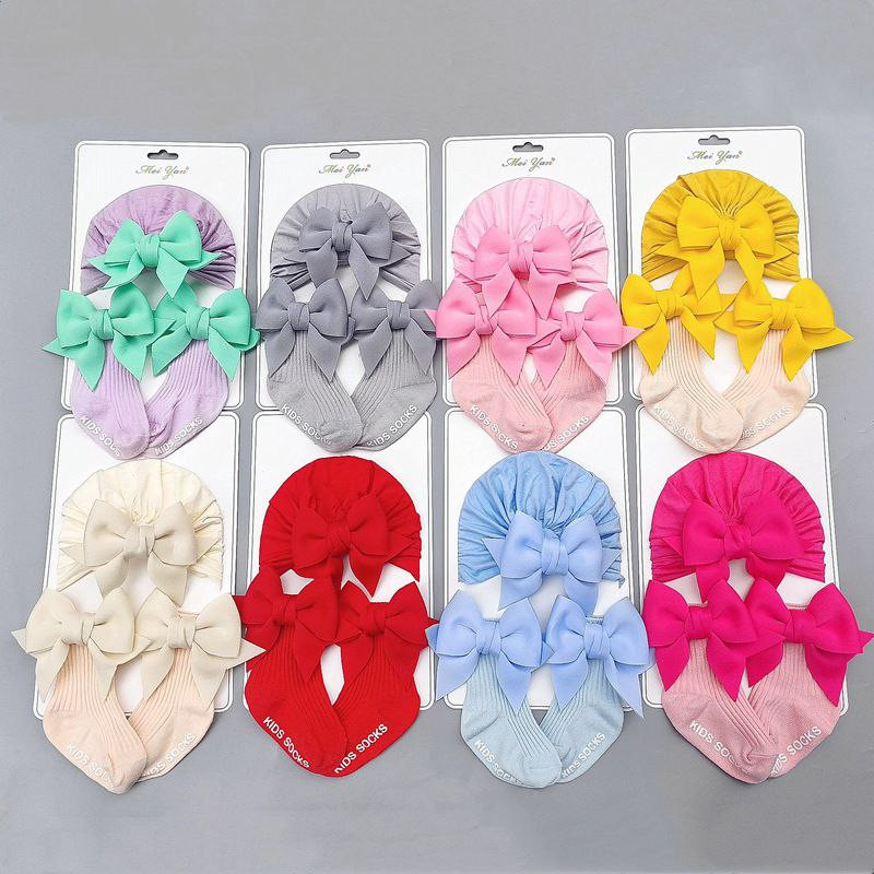 Chapeau de bébé nouveau-né style mince bébé fille chapeau de bébé 0-6 mois ensemble de chaussettes de chapeau de nouveau-né monocouche